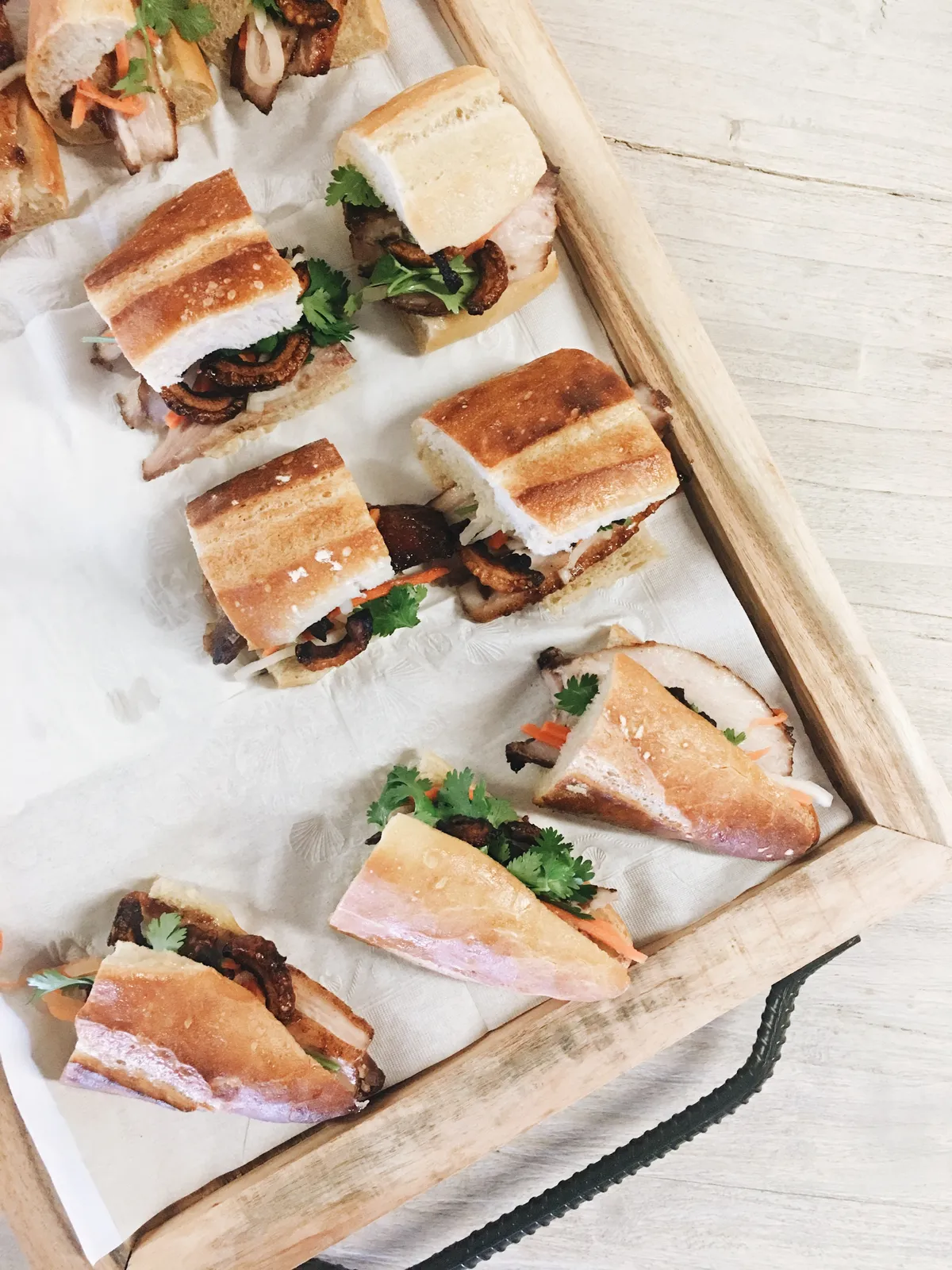 Board of catered baguette sandwiches